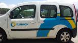 Furgoneta rotulada con el logo de Ilunion