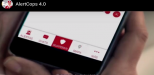 Un smartphone con la aplicación AlertCops 4.0 en pantalla.