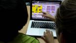 Niños programando en Scratch